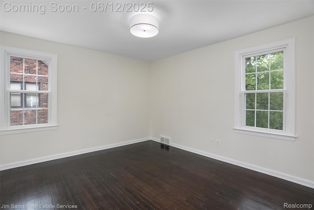 249 Ridgemont Rd, Grosse Pointe, MI 48236 - spare room featuring dark wood finished floors and plenty of natural light