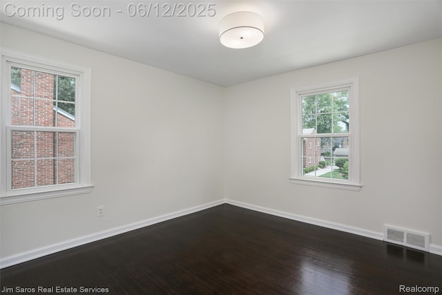 249 Ridgemont Rd, Grosse Pointe, MI 48236 - spare room with dark wood-style flooring