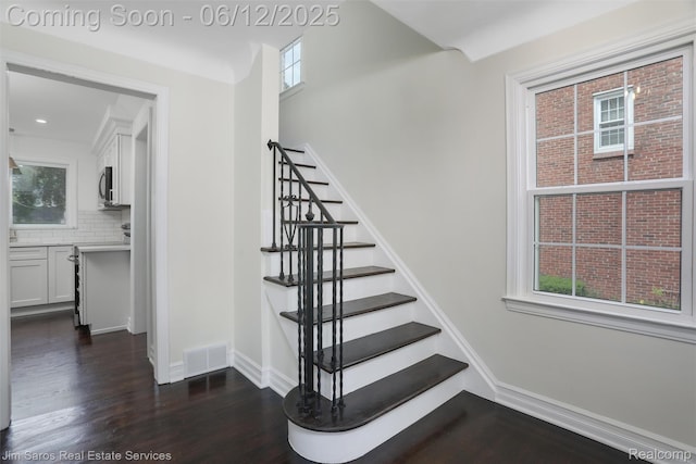 249 Ridgemont Rd, Grosse Pointe, MI 48236 - stairs featuring wood finished floors and baseboards