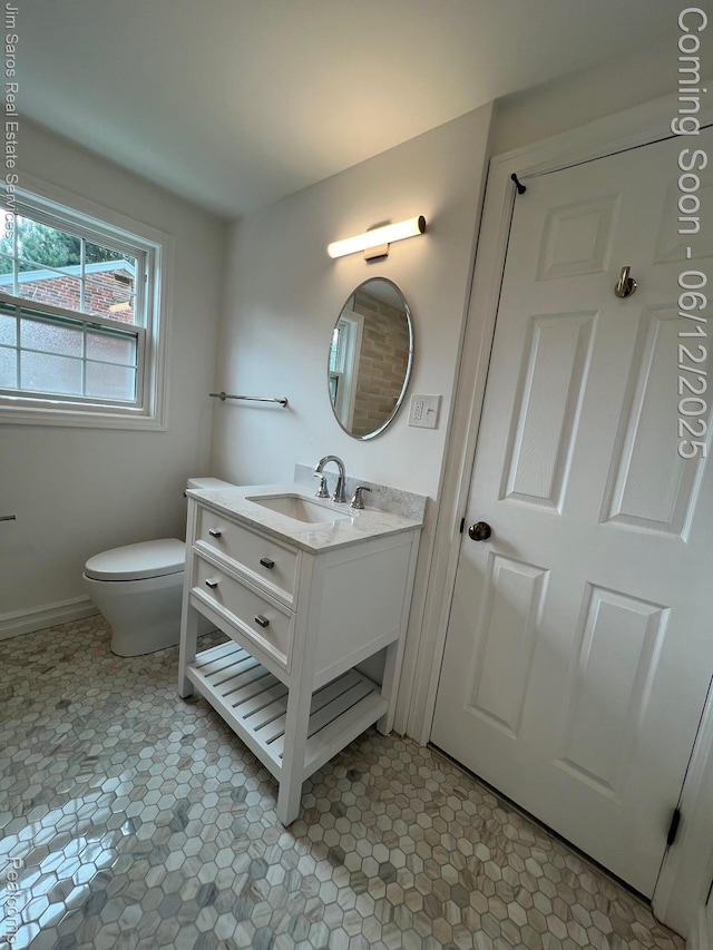 249 Ridgemont Rd, Grosse Pointe, MI 48236 - bathroom featuring vanity and toilet