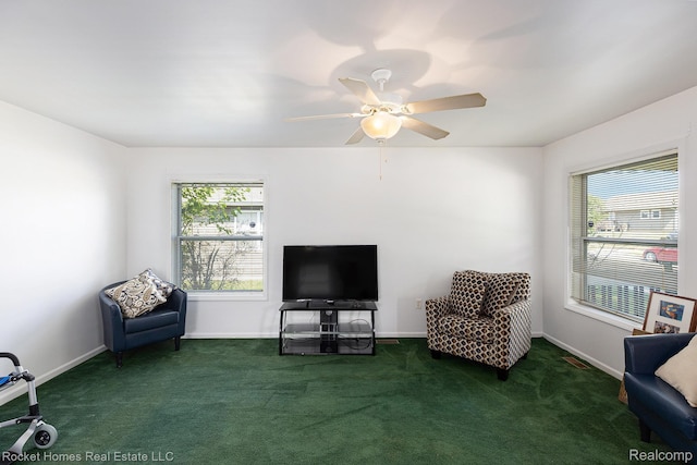 354 Ferry Ave, Pontiac, MI 48341 - living area with plenty of natural light, carpet flooring, and a ceiling fan