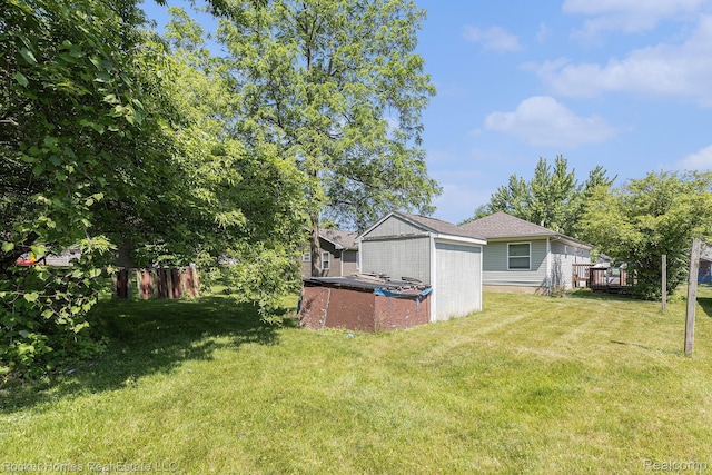 354 Ferry Ave, Pontiac, MI 48341 - view of green lawn with a shed