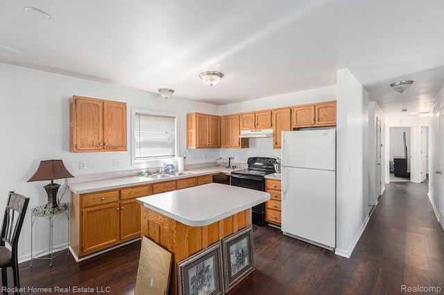 354 Ferry Ave, Pontiac, MI 48341 - kitchen with freestanding refrigerator, black electric range, under cabinet range hood, light countertops, and dark wood-style flooring