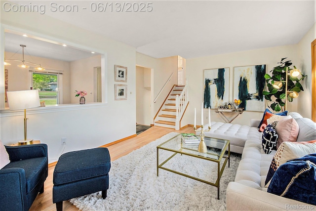 3255 School House Dr, Waterford, MI 48329 - living area featuring wood finished floors and stairs