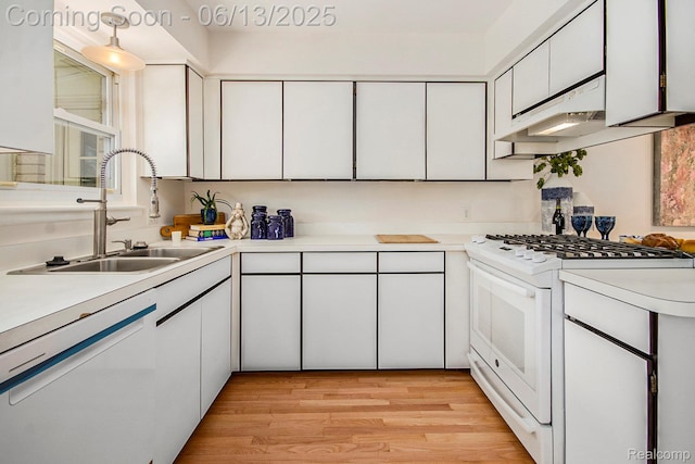 3255 School House Dr, Waterford, MI 48329 - kitchen with white appliances, light countertops, white cabinets, and light wood-type flooring