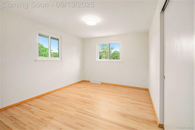 3255 School House Dr, Waterford, MI 48329 - spare room with wood finished floors