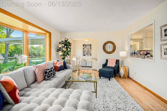 3255 School House Dr, Waterford, MI 48329 - living area featuring wood finished floors and baseboards