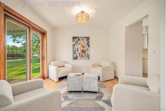 3255 School House Dr, Waterford, MI 48329 - living area with a water view and light wood-style floors