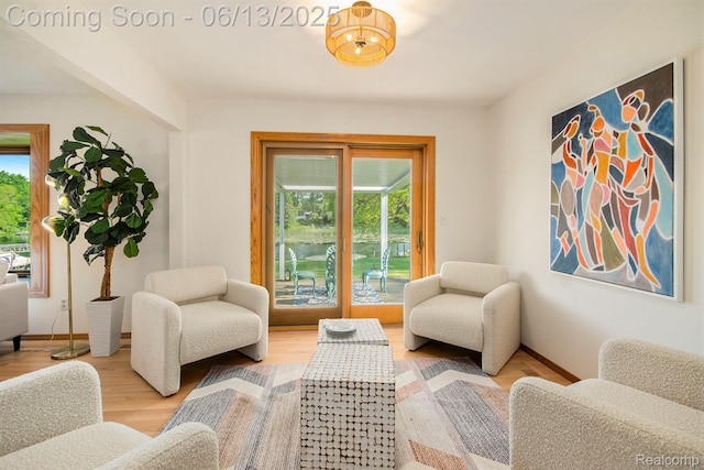 3255 School House Dr, Waterford, MI 48329 - sitting room featuring baseboards and wood finished floors