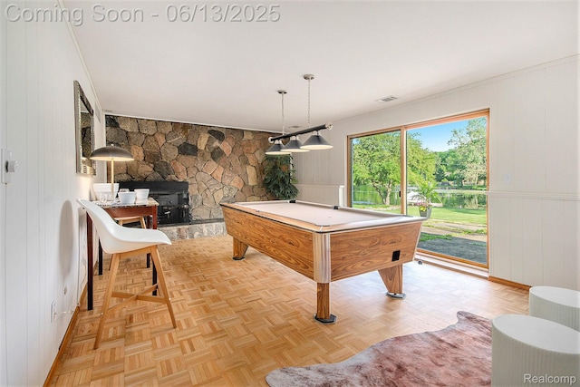 3255 School House Dr, Waterford, MI 48329 - playroom featuring billiards table, a wood stove, and wooden walls