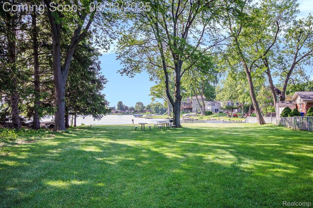 3255 School House Dr, Waterford, MI 48329 - view of yard featuring a water view