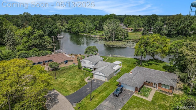 3255 School House Dr, Waterford, MI 48329 - aerial view of a nearby body of water and a heavily wooded area