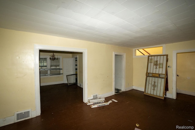 2476 Ford St, Detroit, MI 48238 - spare room with a chandelier and baseboards