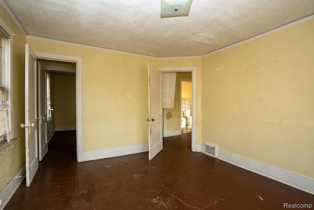 2476 Ford St, Detroit, MI 48238 - spare room with a textured ceiling and ornamental molding