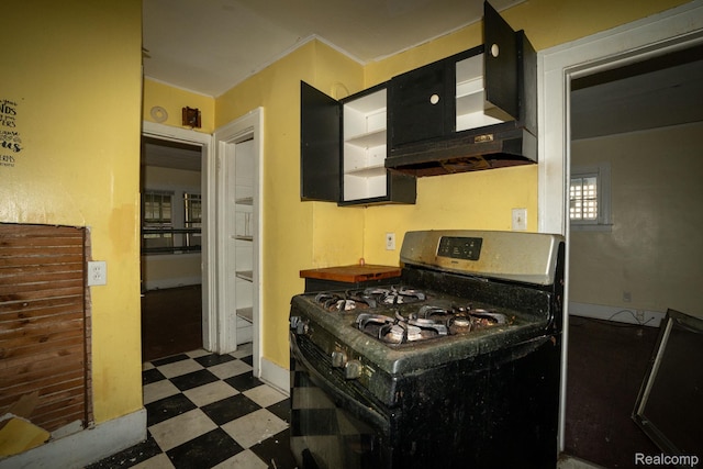 2476 Ford St, Detroit, MI 48238 - kitchen with black gas range and tile patterned floors