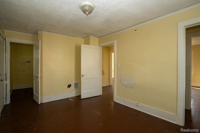 2476 Ford St, Detroit, MI 48238 - unfurnished bedroom with crown molding and a textured ceiling