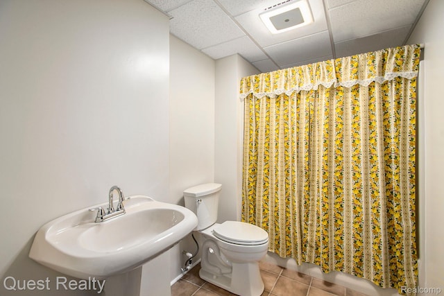 14050 Shannon Dr, Cement City, MI 49233 - bathroom with tile patterned flooring, a shower with curtain, and a paneled ceiling