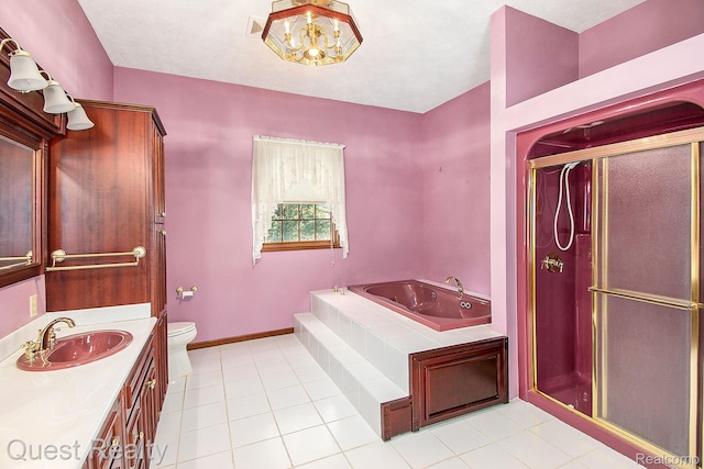 14050 Shannon Dr, Cement City, MI 49233 - bathroom with vanity, a bath, a stall shower, and tile patterned floors