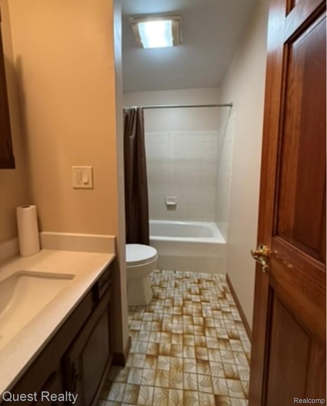14050 Shannon Dr, Cement City, MI 49233 - bathroom with vanity and shower / bath combo with shower curtain