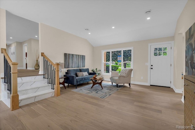 27853 Johnson Rd, Grosse Ile, MI 48138 - living area featuring light wood-style flooring, stairway, lofted ceiling, and recessed lighting