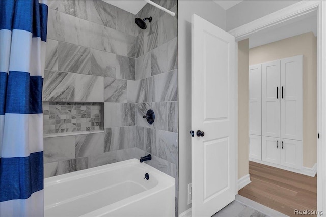 27853 Johnson Rd, Grosse Ile, MI 48138 - bathroom with shower / bath combination with curtain and wood finished floors