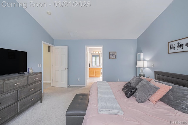 894 Canyon Creek Dr, Holly, MI 48442 - bedroom with vaulted ceiling, carpet floors, and connected bathroom