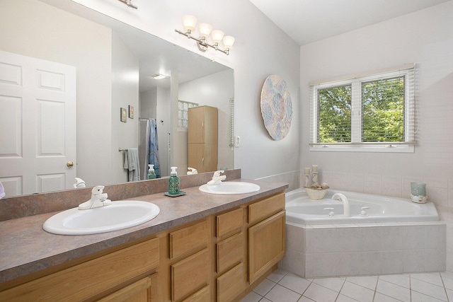 5448 Waterfield Ct, Ann Arbor, MI 48108 - bathroom with tile patterned floors, double vanity, and a bath