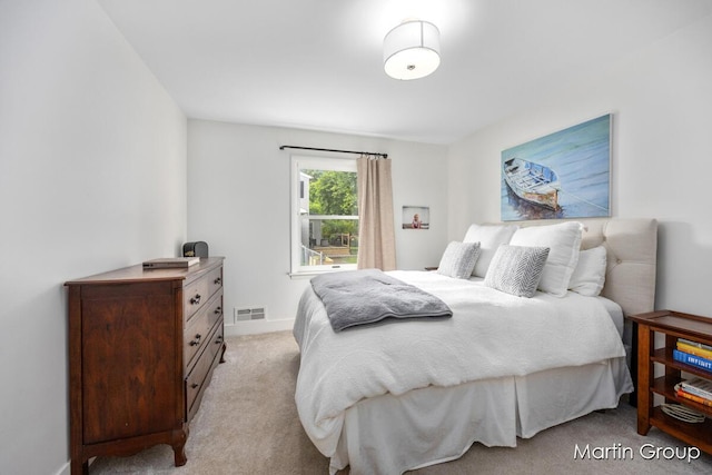 2243 Cambridge Dr SE, Grand Rapids, MI 49506 - bedroom with light carpet and baseboards