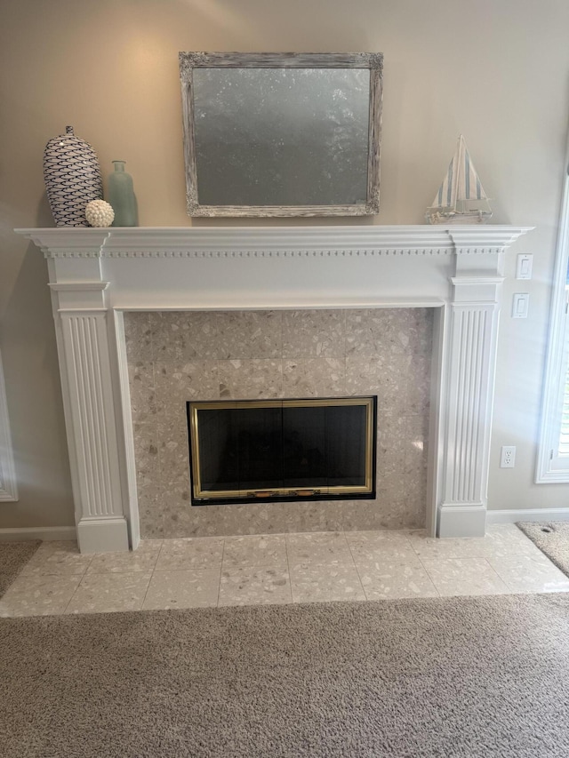 6927 Plum Hollow Cir, Kalamazoo, MI 49009 - detailed view of a tiled fireplace and carpet flooring