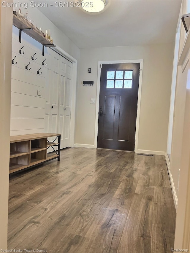 8811 Coyle Dr, Pinckney, MI 48169 - mudroom with wood finished floors and baseboards
