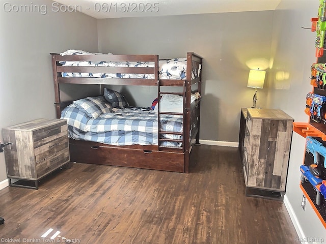 8811 Coyle Dr, Pinckney, MI 48169 - bedroom featuring wood finished floors and baseboards