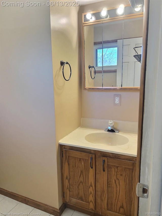 8811 Coyle Dr, Pinckney, MI 48169 - bathroom featuring vanity and tile patterned floors