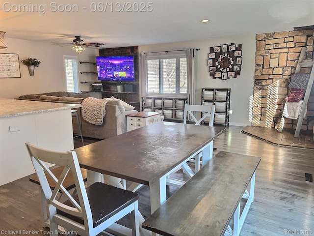 8811 Coyle Dr, Pinckney, MI 48169 - dining room with wood finished floors, ceiling fan, and recessed lighting