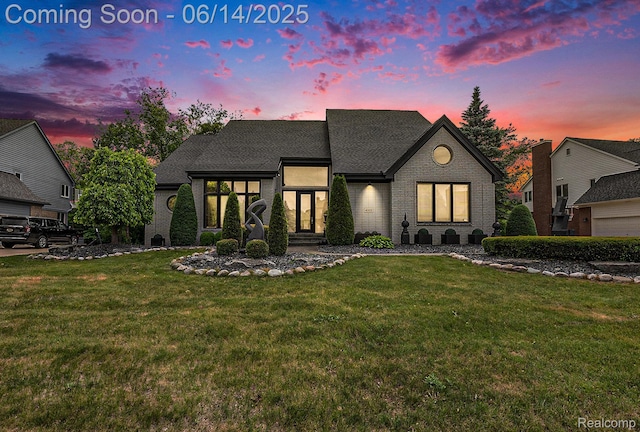 4322 Darlene Dr, Commerce Twp, MI 48382 - view of front of property featuring brick siding and a lawn