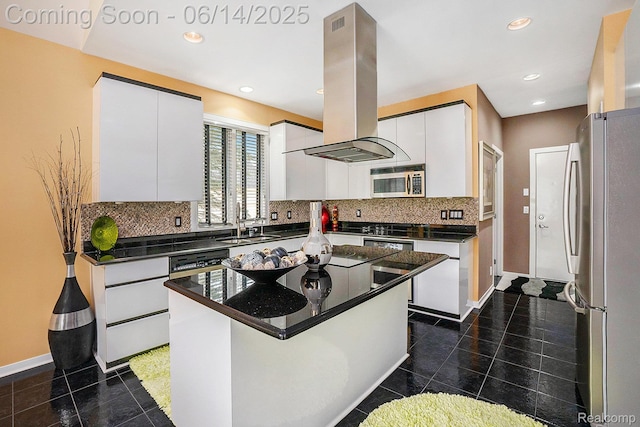 4322 Darlene Dr, Commerce Twp, MI 48382 - kitchen featuring stainless steel appliances, island exhaust hood, dark countertops, white cabinets, and recessed lighting