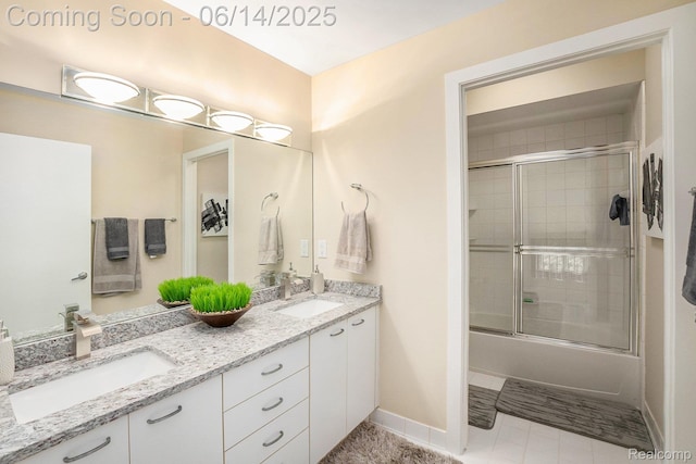 4322 Darlene Dr, Commerce Twp, MI 48382 - full bathroom featuring double vanity and shower / bath combination with glass door
