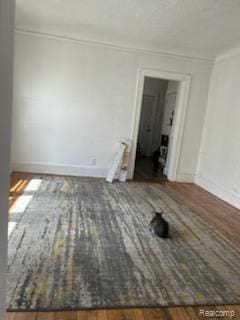 19131 Cliff St, Detroit, MI 48234 - unfurnished room with ornamental molding and wood finished floors