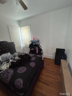 19131 Cliff St, Detroit, MI 48234 - bedroom featuring wood finished floors, radiator, and ceiling fan