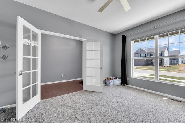 2799 Gallop Way, Saline, MI 48176 - carpeted empty room with french doors, lofted ceiling, and a ceiling fan