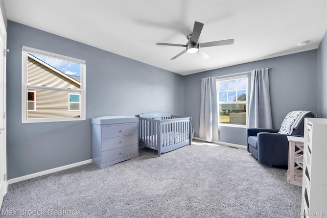 2799 Gallop Way, Saline, MI 48176 - carpeted bedroom with a nursery area and ceiling fan