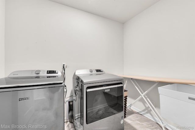 2799 Gallop Way, Saline, MI 48176 - washroom with washer and dryer and light marble finish flooring