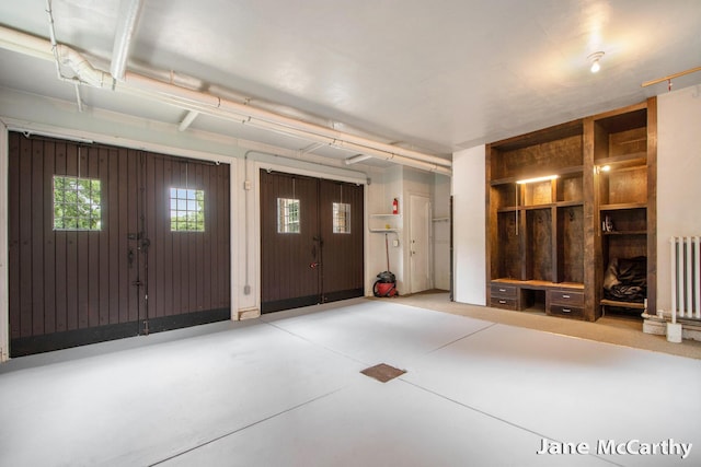 1101 Cadillac Dr SE, Grand Rapids, MI 49506 - garage with radiator heating unit