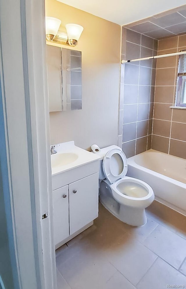15593 Thomas Ave, Allen Park, MI 48101 - bathroom featuring vanity, tile patterned floors, and  shower combination