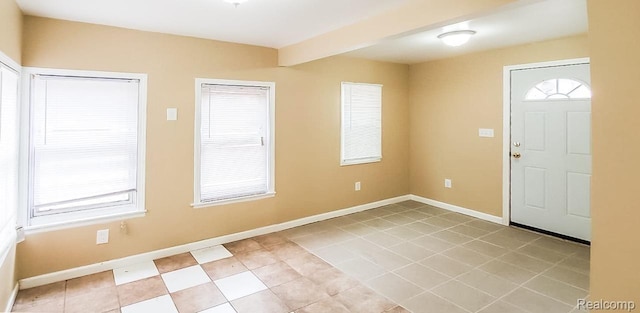 15593 Thomas Ave, Allen Park, MI 48101 - entrance foyer with healthy amount of natural light and light tile patterned floors
