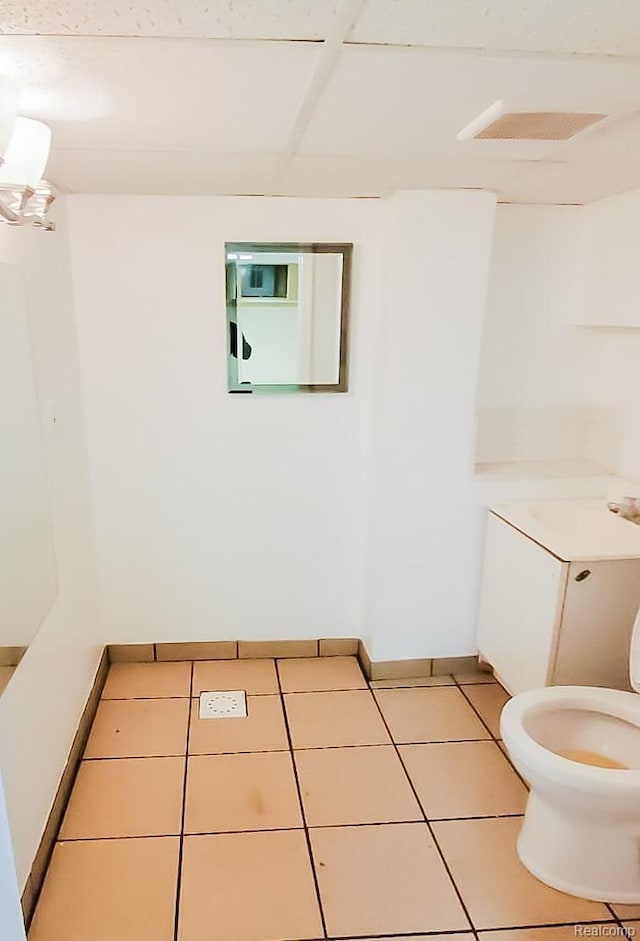 15593 Thomas Ave, Allen Park, MI 48101 - bathroom with toilet and tile patterned floors