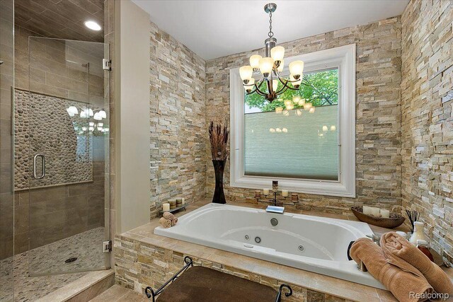 1330 Oxford Rd, Bloomfield Hills, MI 48304 - bathroom with a chandelier, a tub with jets, and a shower stall