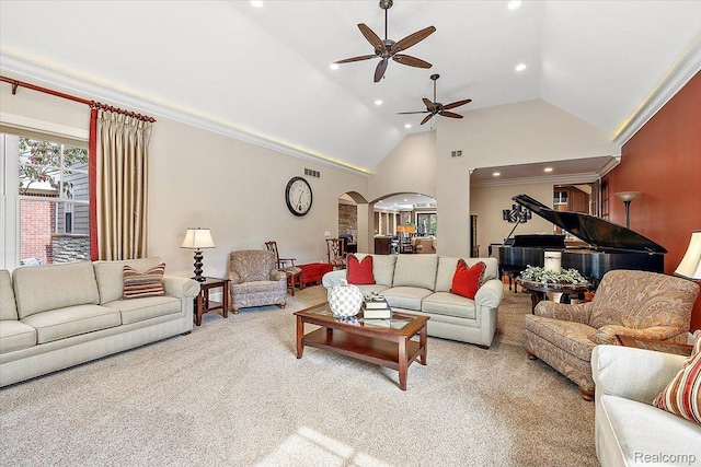 1330 Oxford Rd, Bloomfield Hills, MI 48304 - carpeted living area with arched walkways, ceiling fan, recessed lighting, and high vaulted ceiling