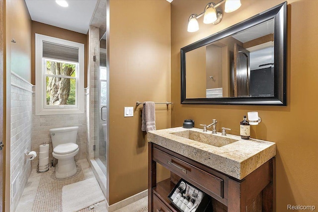 1330 Oxford Rd, Bloomfield Hills, MI 48304 - bathroom featuring vanity, a stall shower, tile patterned flooring, and tile walls