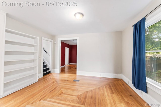 1226 W Genesee St, Lapeer, MI 48446 - unfurnished room with stairs and built in shelves