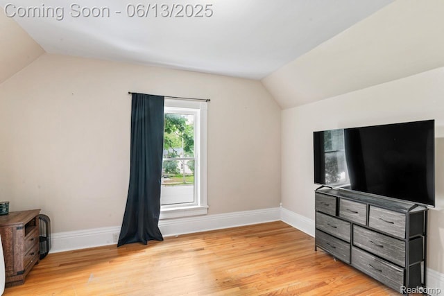 1226 W Genesee St, Lapeer, MI 48446 - additional living space featuring lofted ceiling and light wood-type flooring
